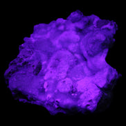 Blue Aragonite Caribbean Calcite specimen 95*55*93mm 343g in UV light - Rocks and Things Store