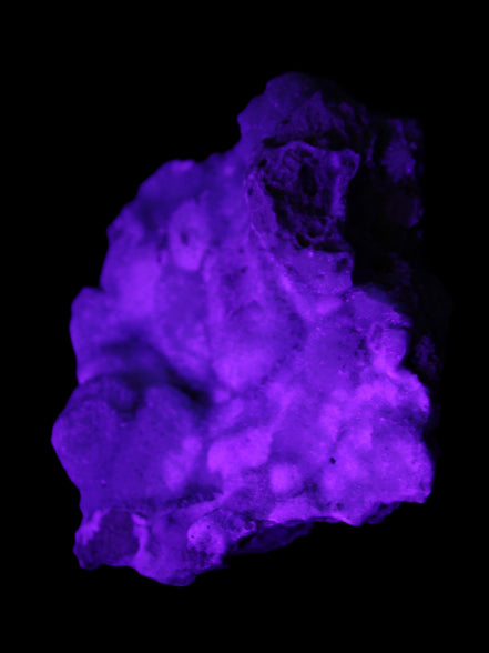 Blue Aragonite Caribbean Calcite specimen 95*55*93mm 343g in UV light - Rocks and Things Store