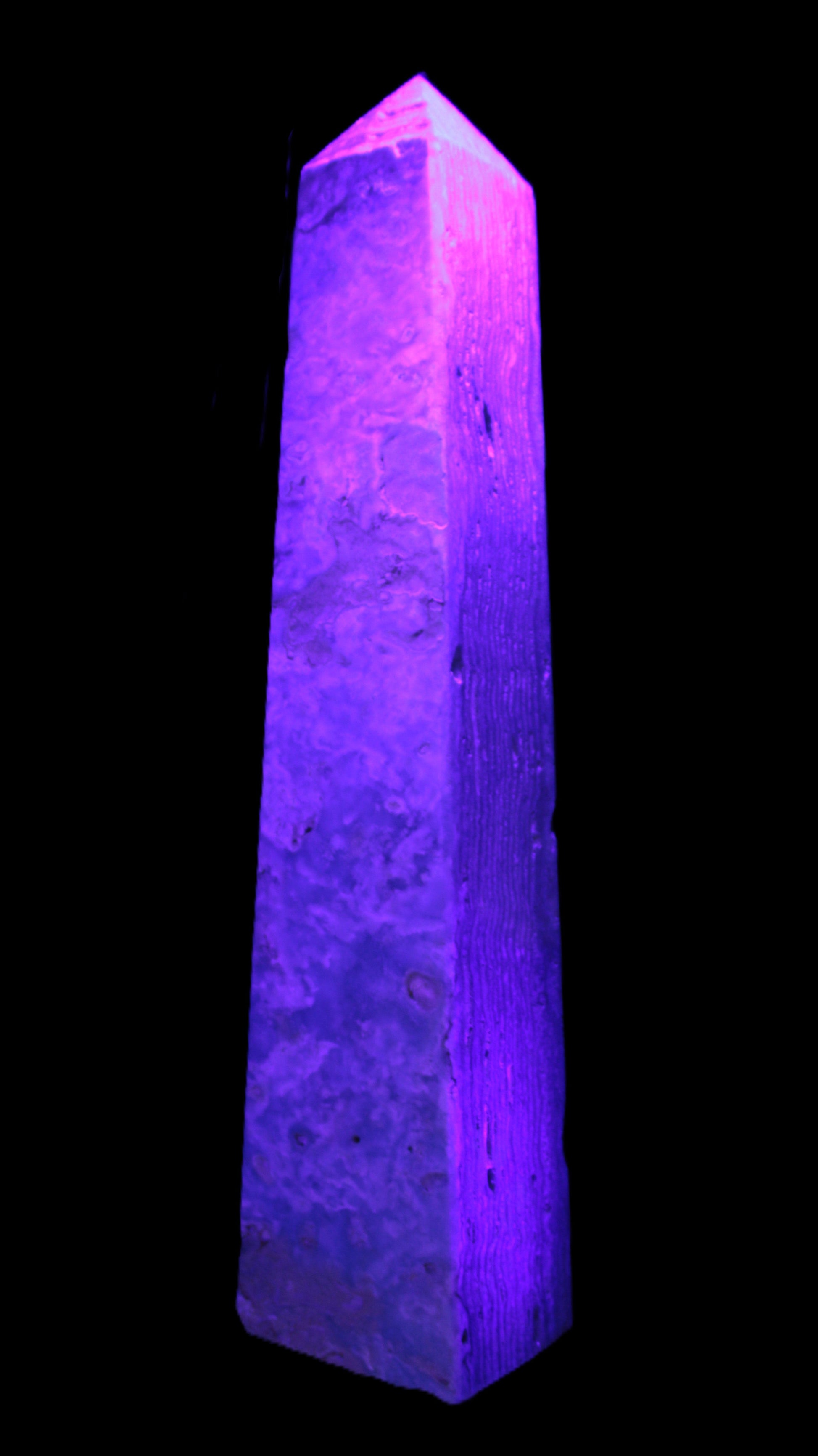 Caribbean Calcite obelisk 348*55*75mm 2574g in UV light - Rocks and Things Store