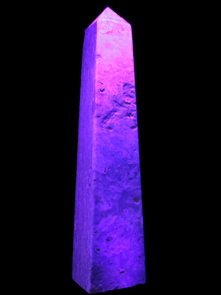 Caribbean Calcite obelisk 348*55*75mm 2574g in UV light - Rocks and Things Store