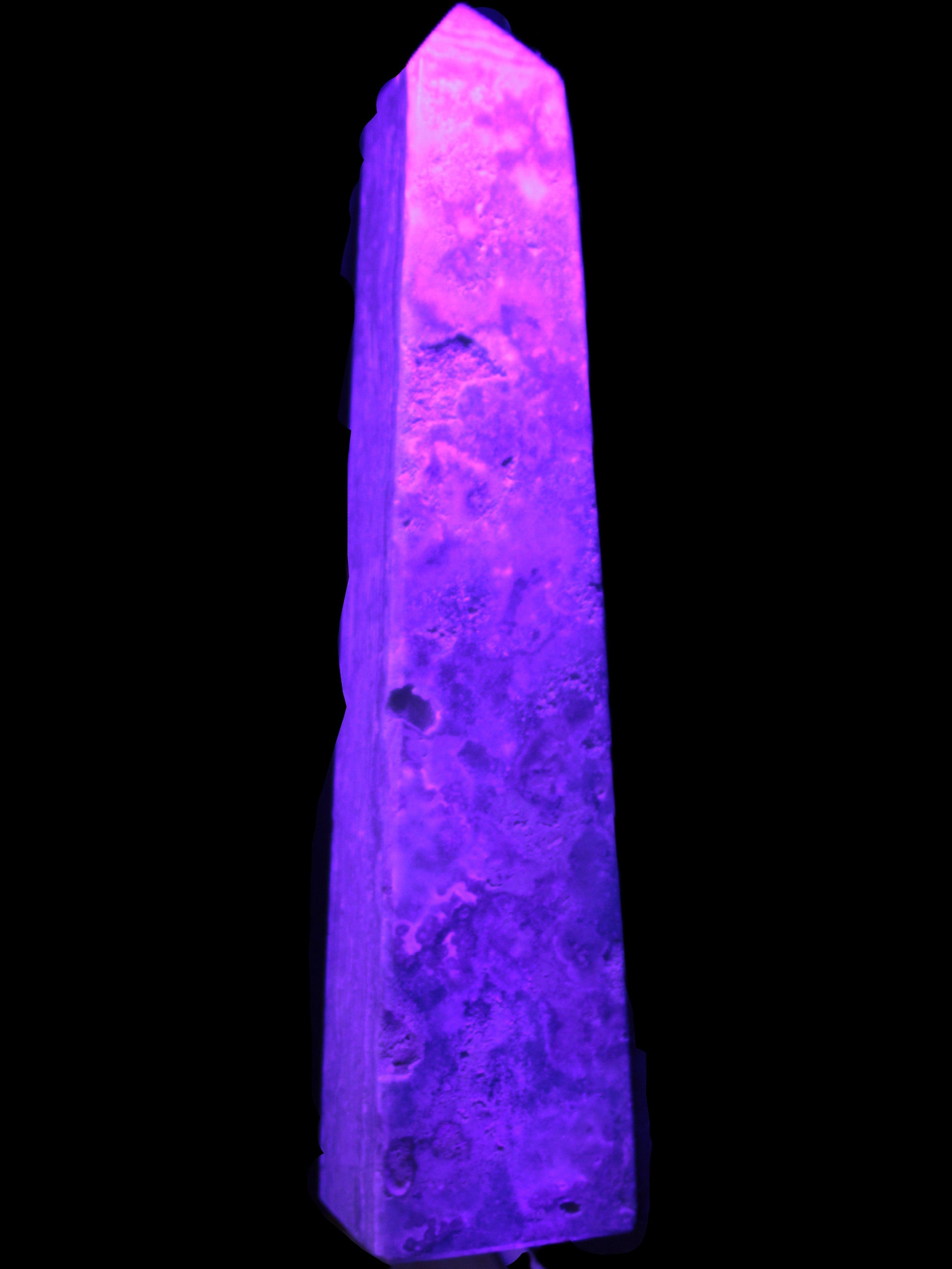 Caribbean Calcite obelisk 348*55*75mm 2574g in UV light - Rocks and Things Store