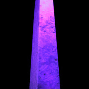 Caribbean Calcite obelisk 348*55*75mm 2574g in UV light - Rocks and Things Store