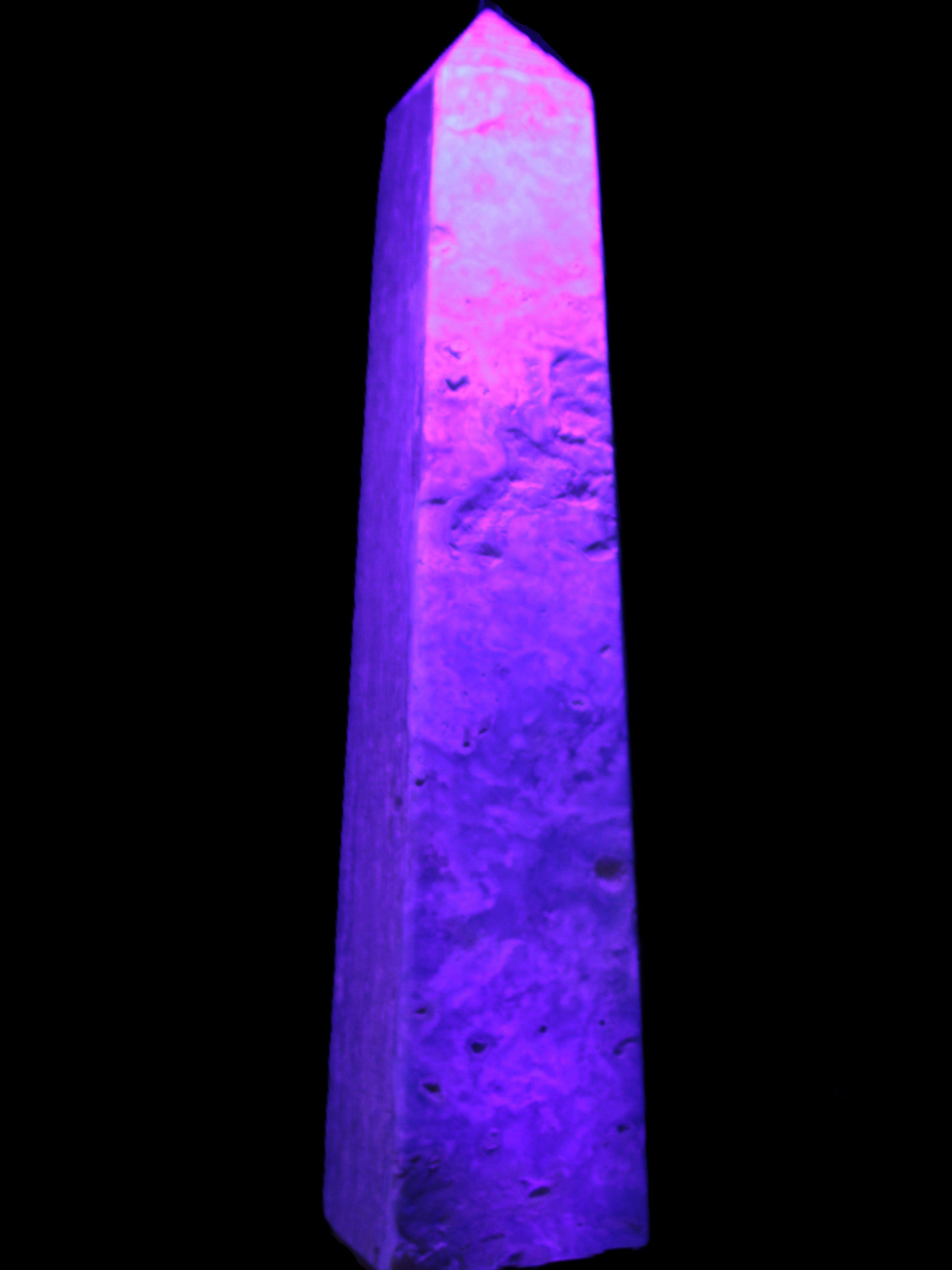 Caribbean Calcite obelisk 348*55*75mm 2574g in UV light - Rocks and Things Store
