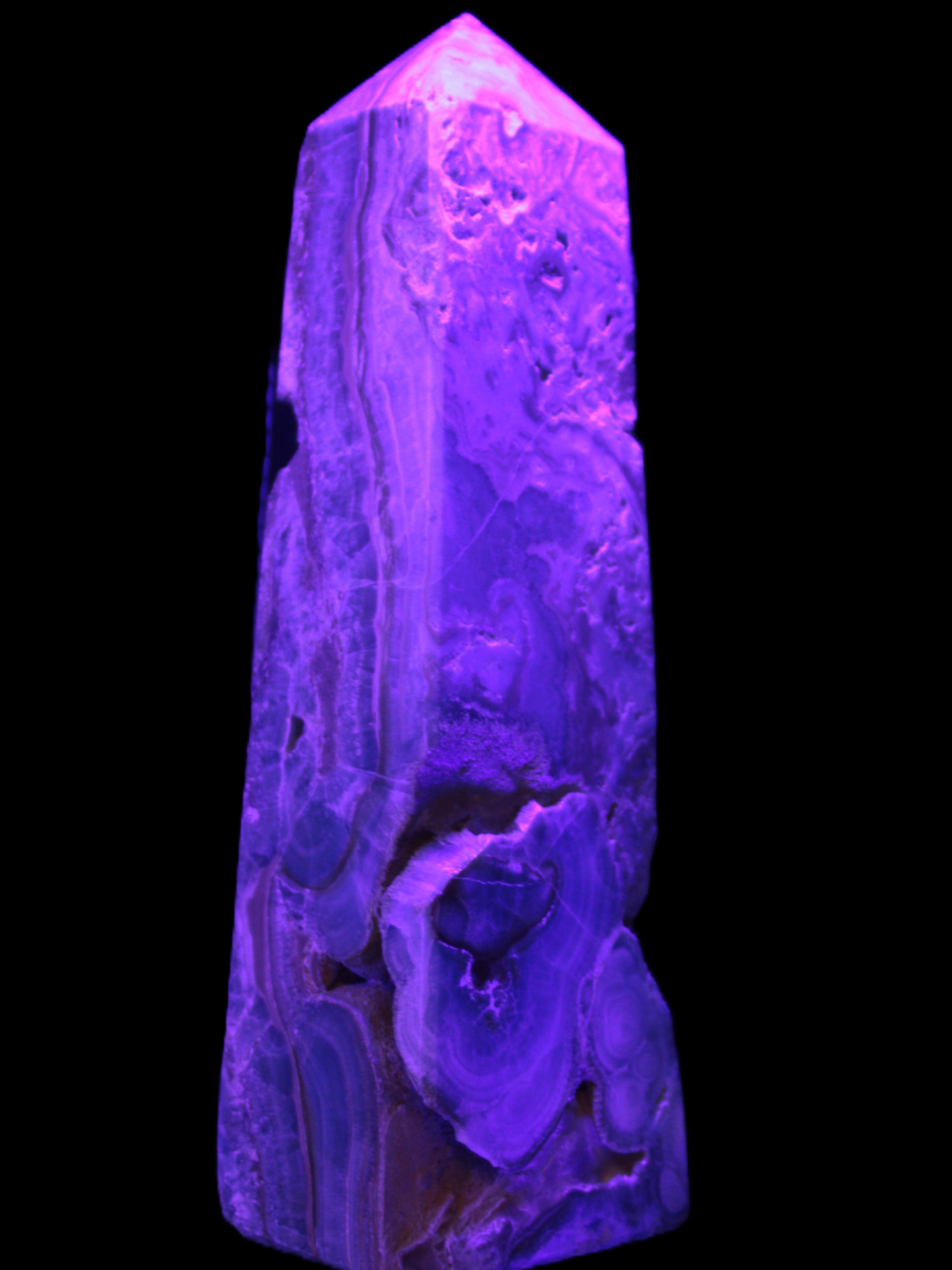 Caribbean Calcite obelisk 228*55*67mm 1554g in UV light - Rocks and Things Store
