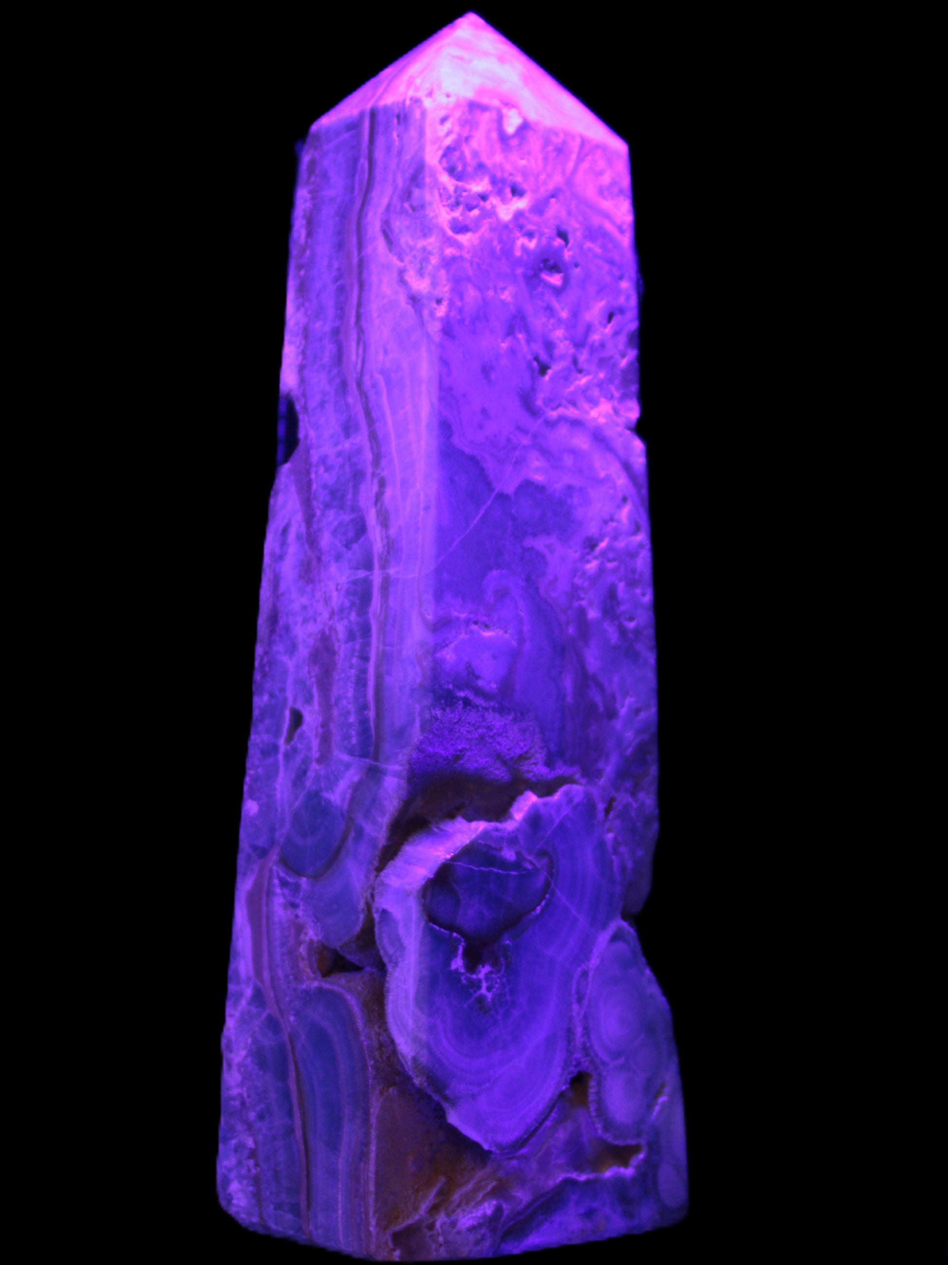 Caribbean Calcite obelisk 228*55*67mm 1554g in UV light - Rocks and Things Store