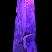 Caribbean Calcite obelisk 228*55*67mm 1554g in UV light - Rocks and Things Store
