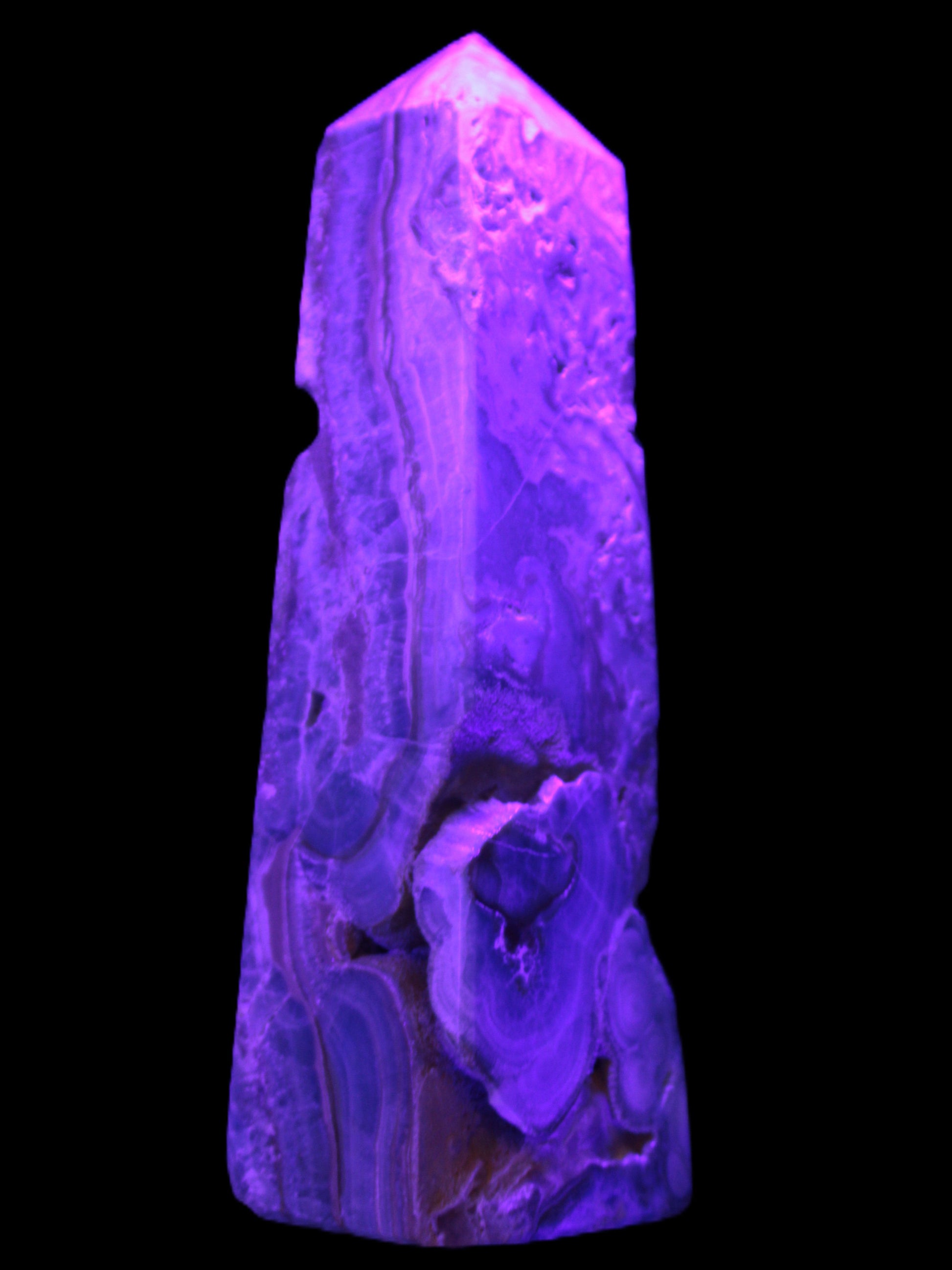 Caribbean Calcite obelisk 228*55*67mm 1554g in UV light - Rocks and Things Store