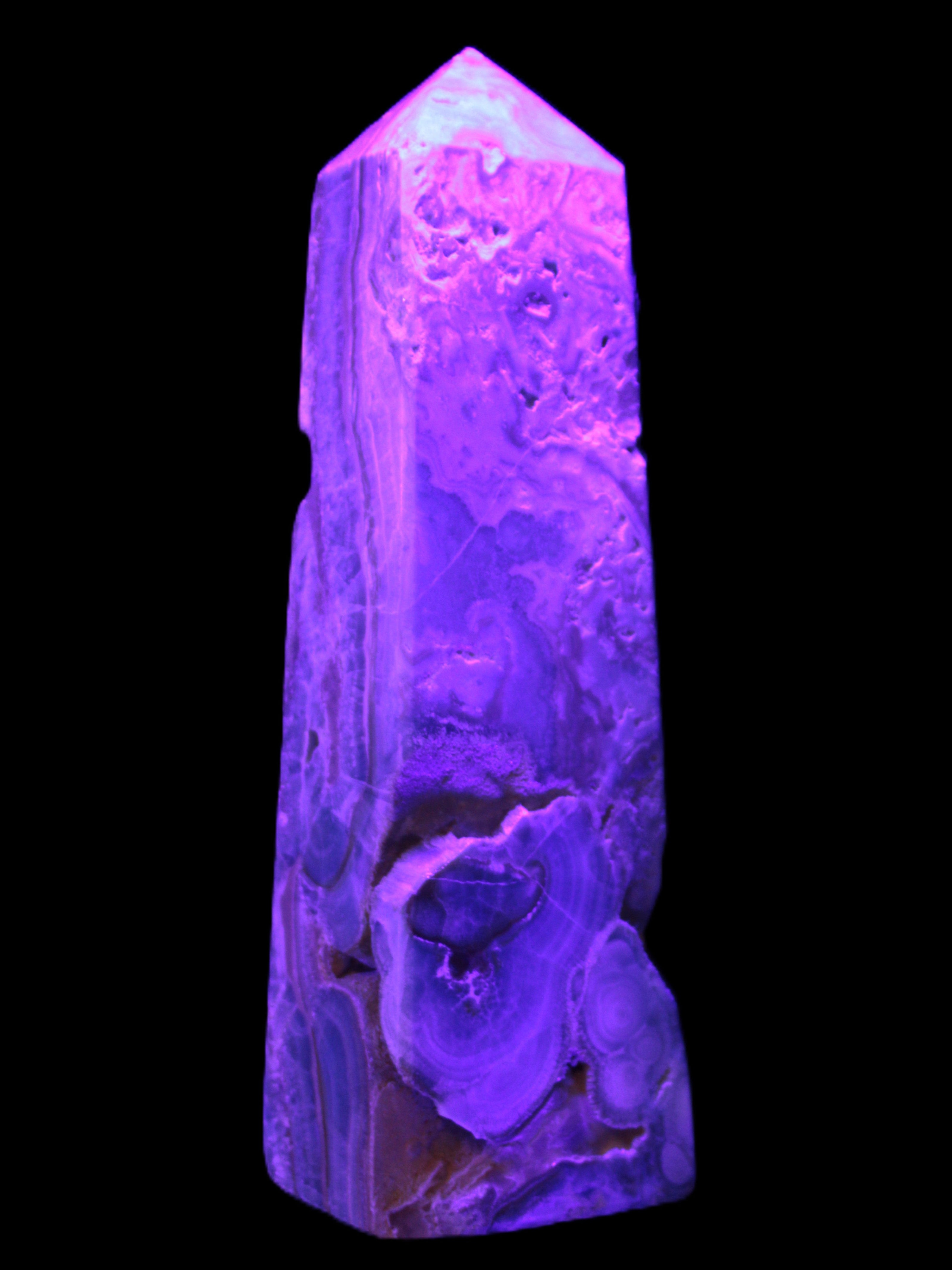 Caribbean Calcite obelisk 228*55*67mm 1554g in UV light - Rocks and Things Store