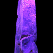Caribbean Calcite obelisk 228*55*67mm 1554g in UV light - Rocks and Things Store
