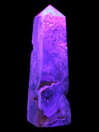 Caribbean Calcite obelisk 228*55*67mm 1554g in UV light - Rocks and Things Store