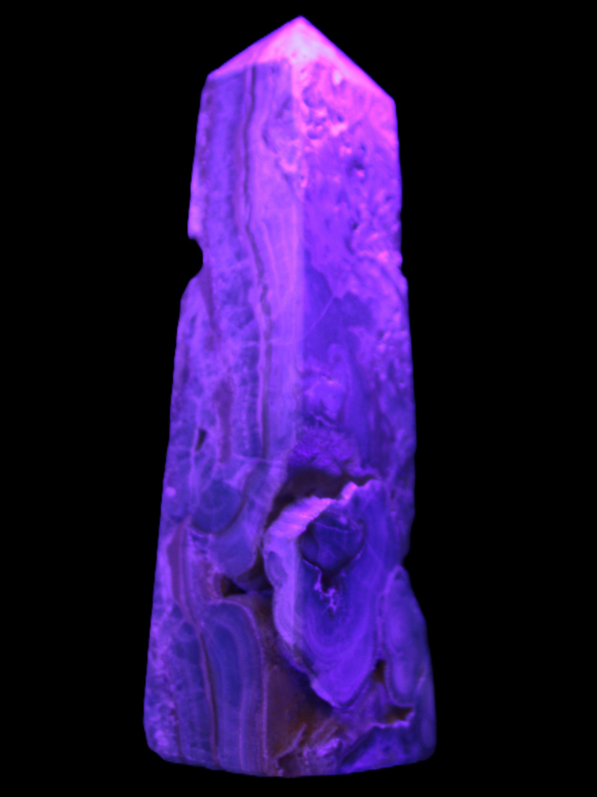 Caribbean Calcite obelisk 228*55*67mm 1554g in UV light - Rocks and Things Store