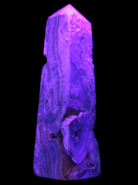 Caribbean Calcite obelisk 228*55*67mm 1554g in UV light - Rocks and Things Store