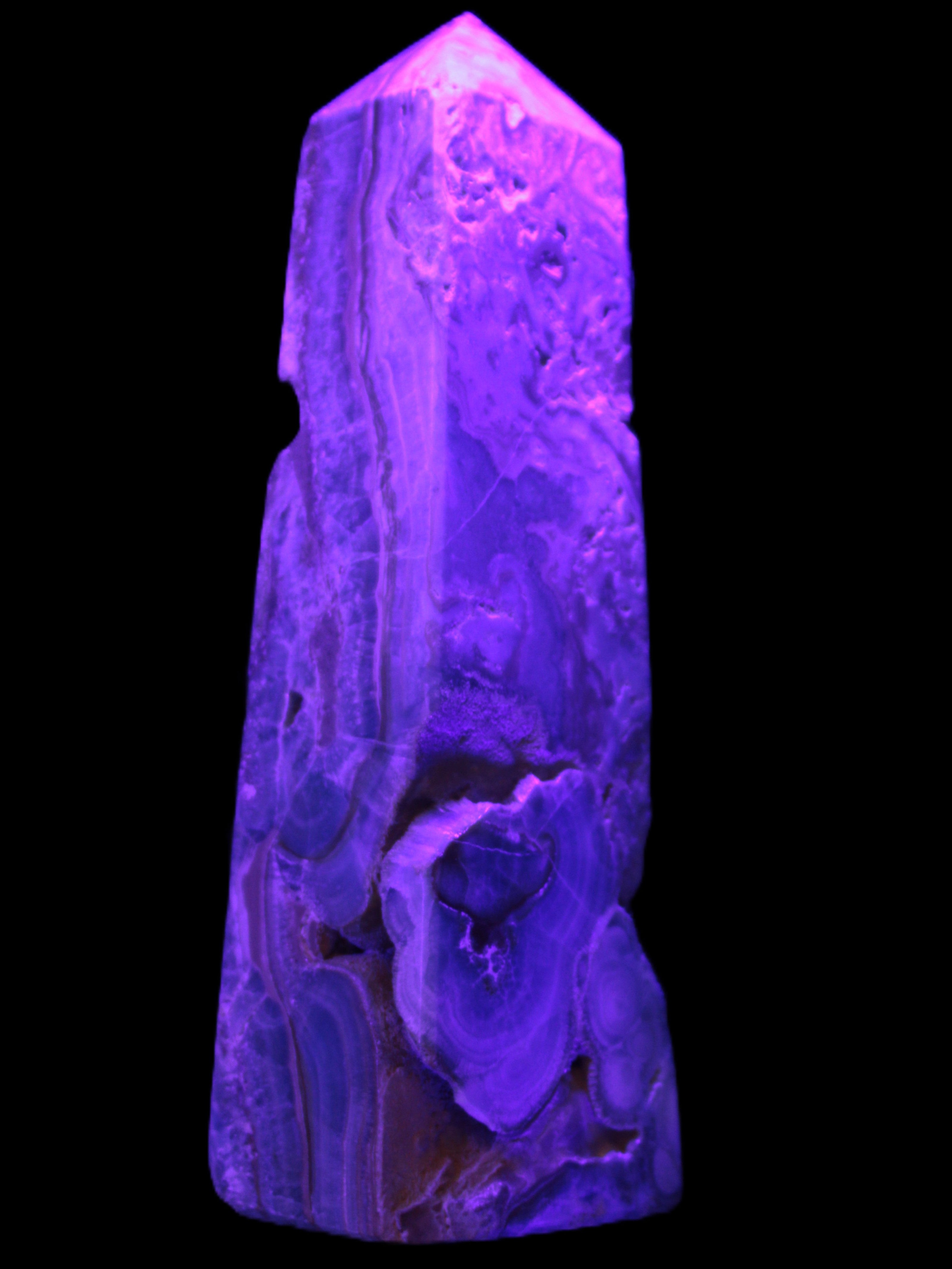 Caribbean Calcite obelisk 228*55*67mm 1554g in UV light - Rocks and Things Store