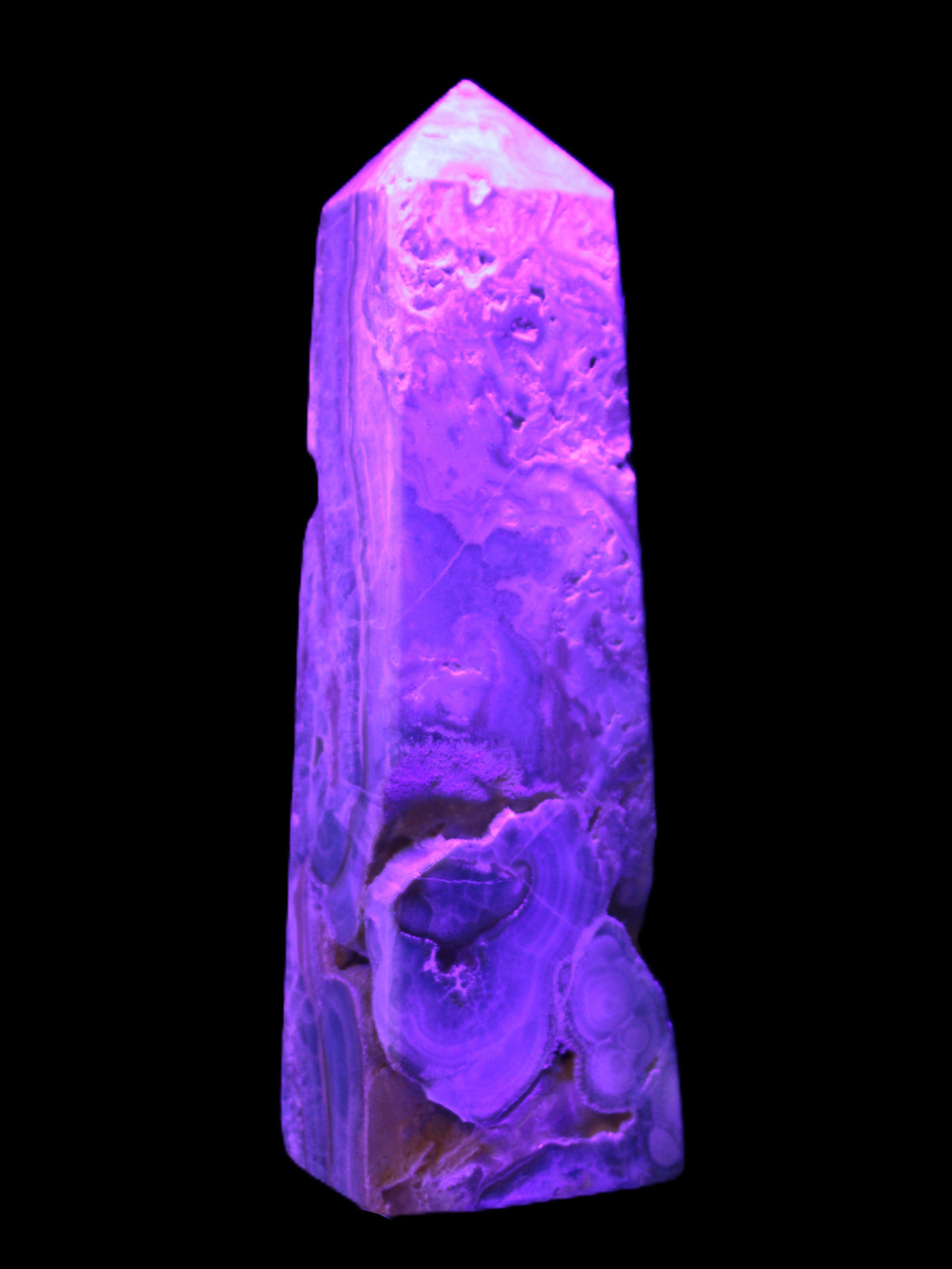 Caribbean Calcite obelisk 228*55*67mm 1554g in UV light - Rocks and Things Store