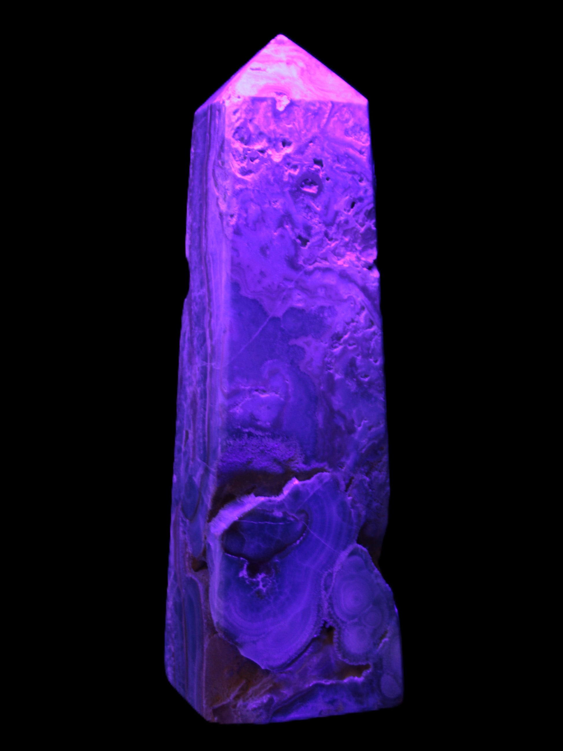 Caribbean Calcite obelisk 228*55*67mm 1554g in UV light - Rocks and Things Store