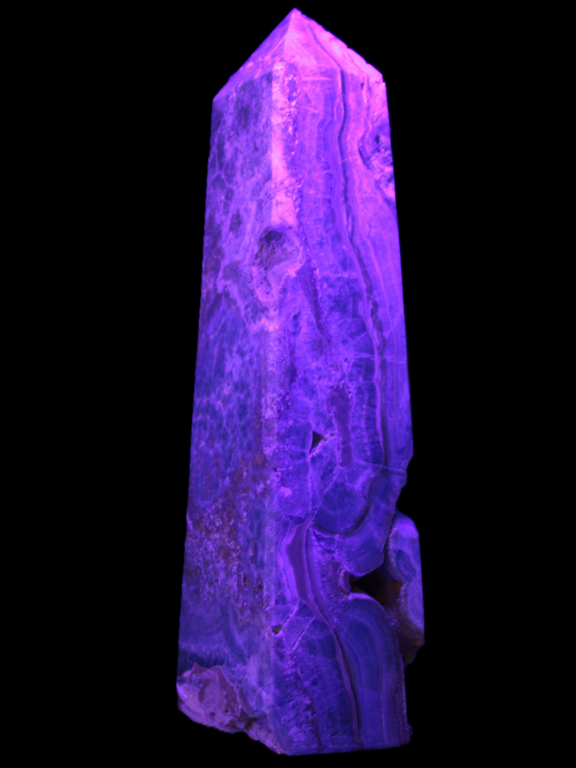 Caribbean Calcite obelisk 228*55*67mm 1554g in UV light - Rocks and Things Store