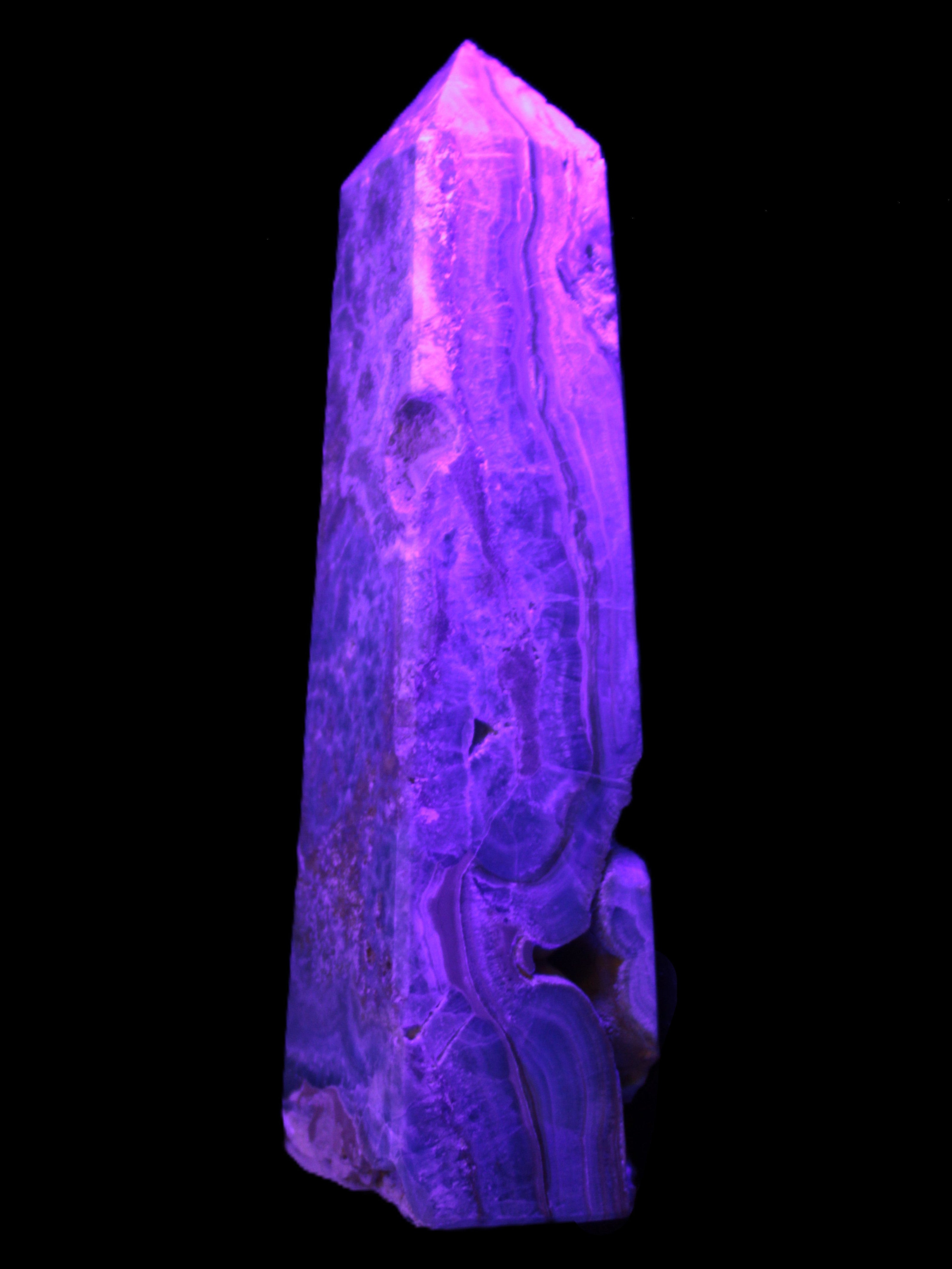 Caribbean Calcite obelisk 228*55*67mm 1554g in UV light - Rocks and Things Store