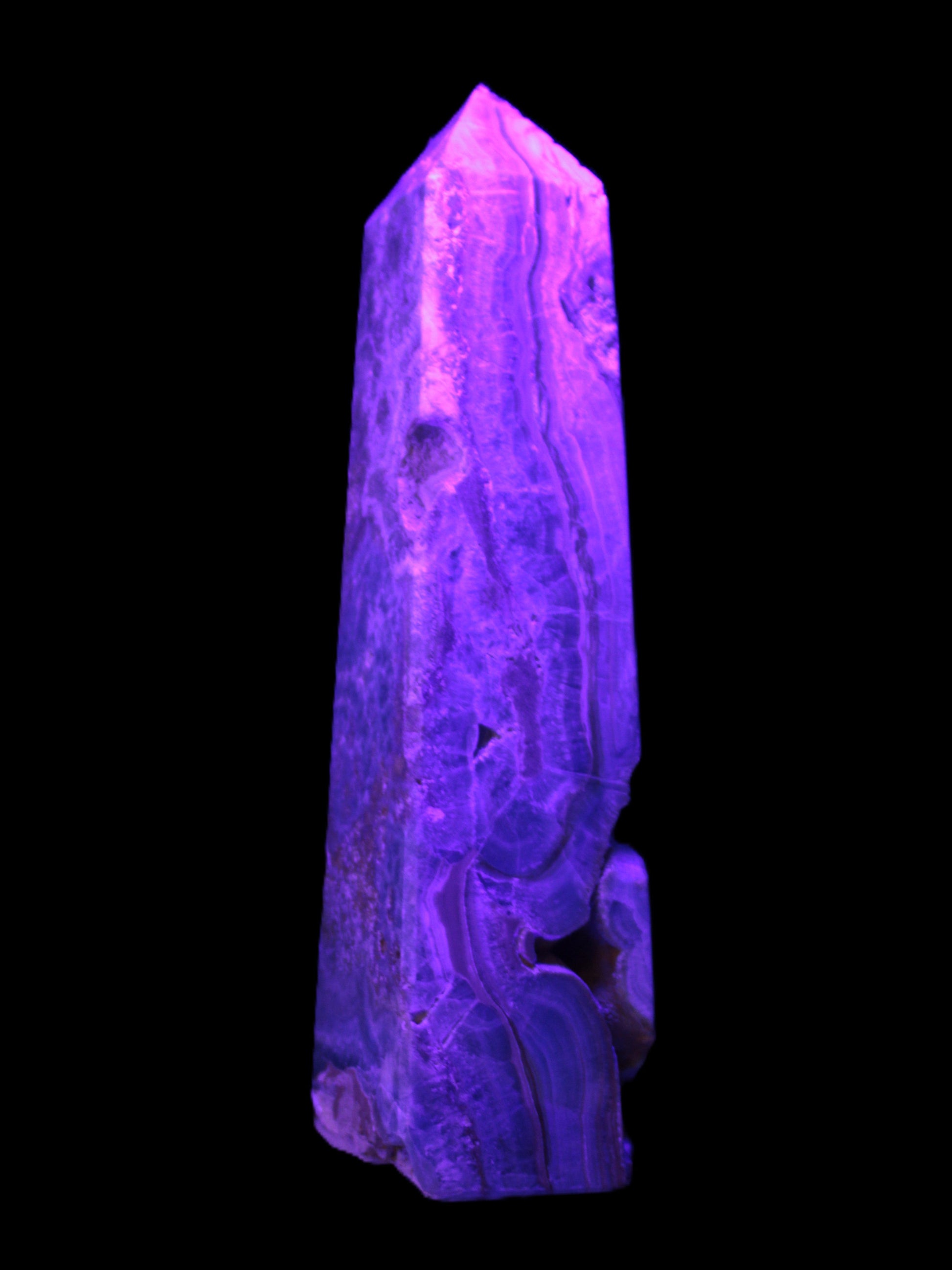Caribbean Calcite obelisk 228*55*67mm 1554g in UV light - Rocks and Things Store