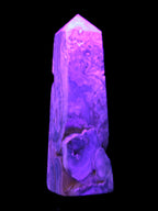 Caribbean Calcite obelisk 228*55*67mm 1554g in UV light - Rocks and Things Store