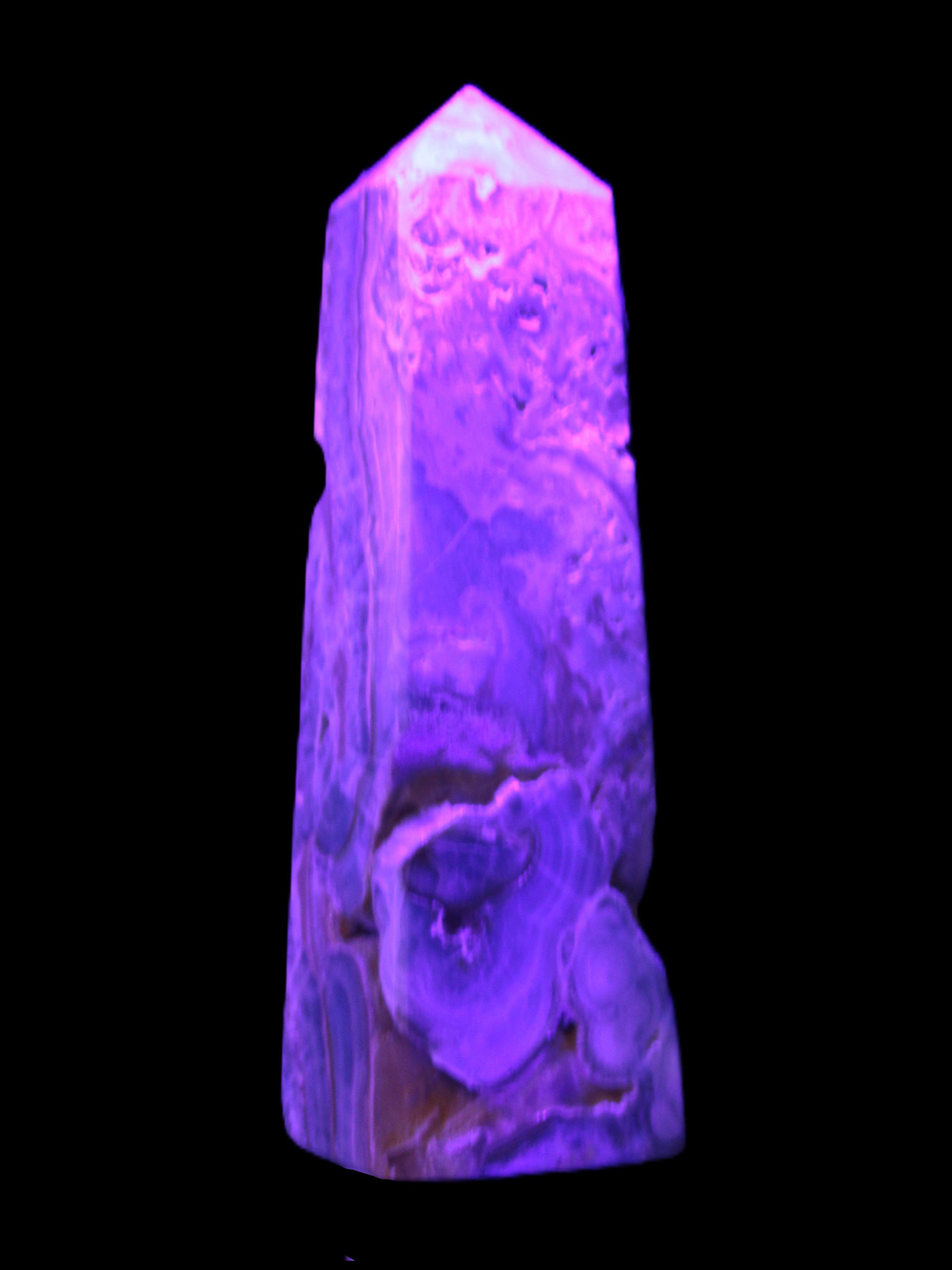 Caribbean Calcite obelisk 228*55*67mm 1554g in UV light - Rocks and Things Store