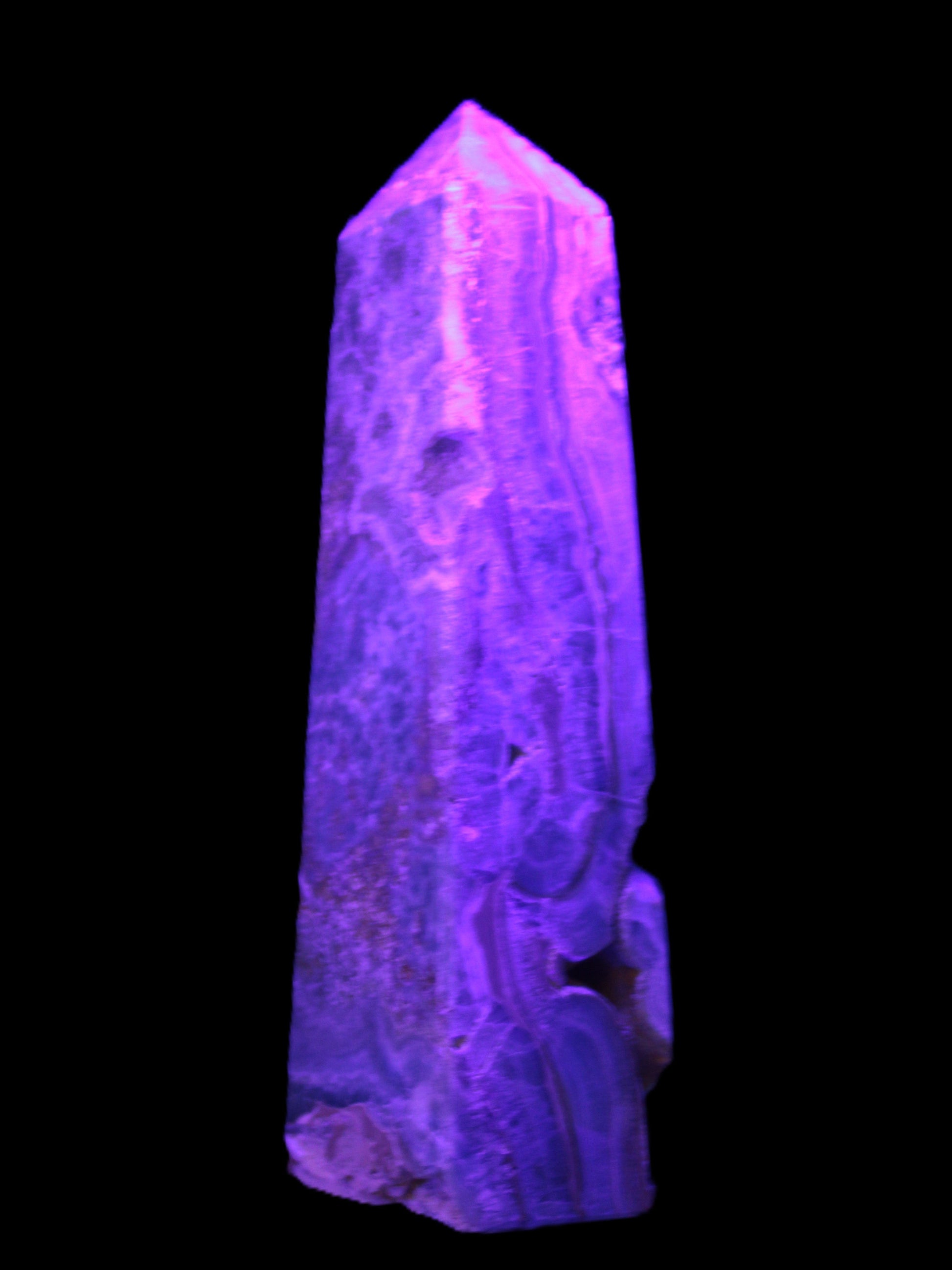 Caribbean Calcite obelisk 228*55*67mm 1554g in UV light - Rocks and Things Store