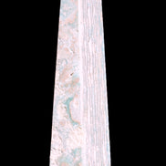 Caribbean Calcite obelisk 95*40*44mm 571g in bright sunlight - Rocks and Things Store