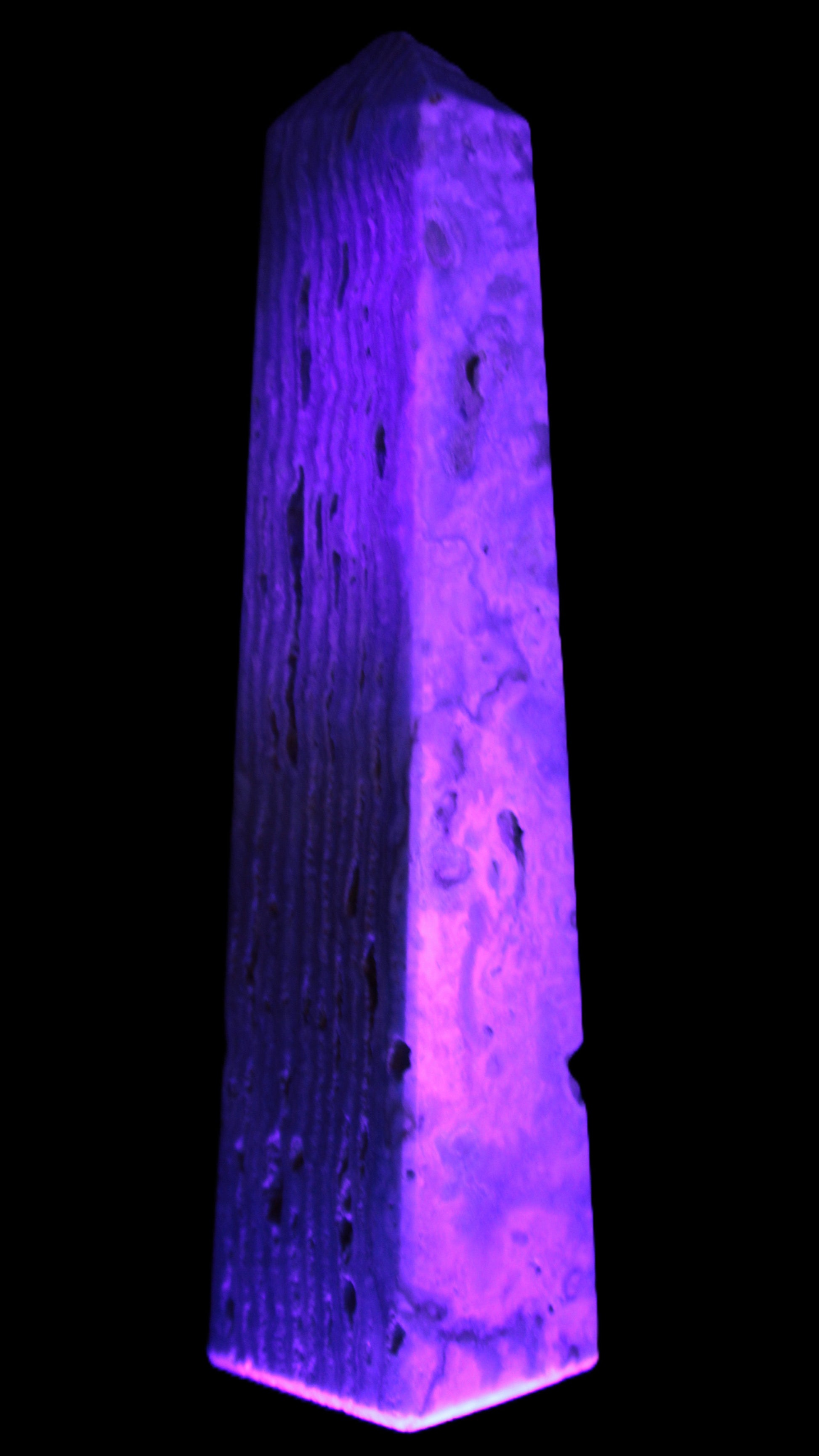Caribbean Calcite obelisk 95*40*44mm 571g in UV light - Rocks and Things Store