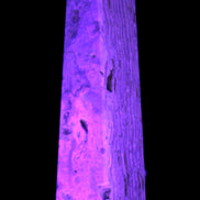 Caribbean Calcite obelisk 95*40*44mm 571g in UV light - Rocks and Things Store