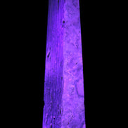 Caribbean Calcite obelisk 95*40*44mm 571g in UV light - Rocks and Things Store