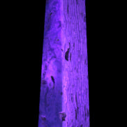 Caribbean Calcite obelisk 95*40*44mm 571g in UV light - Rocks and Things Store