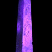 Caribbean Calcite obelisk 95*40*44mm 571g in UV light - Rocks and Things Store