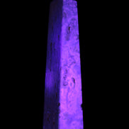 Caribbean Calcite obelisk 95*40*44mm 571g in UV light - Rocks and Things Store