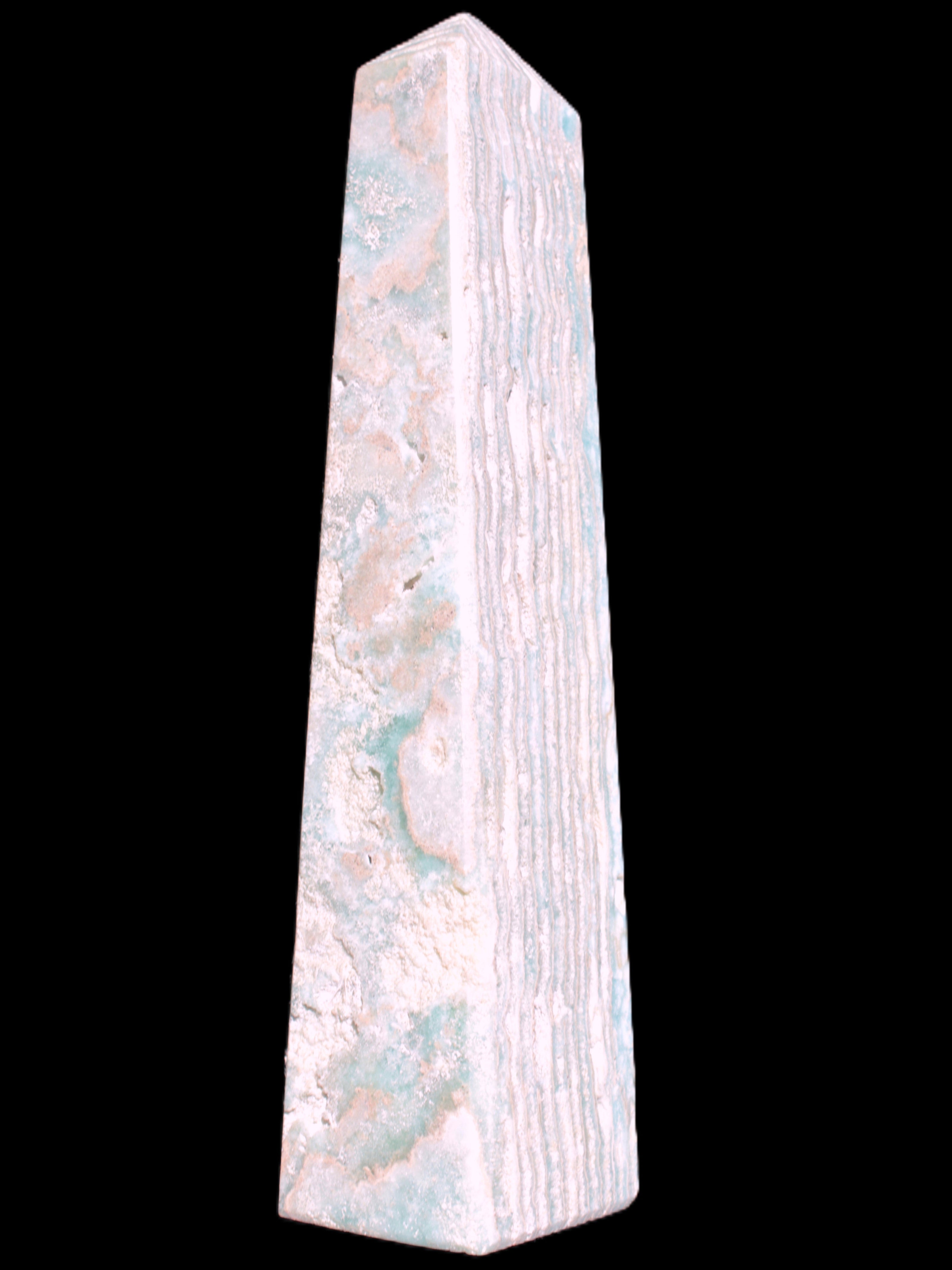 Caribbean Calcite obelisk 95*40*44mm 571g in bright sunlight - Rocks and Things Store