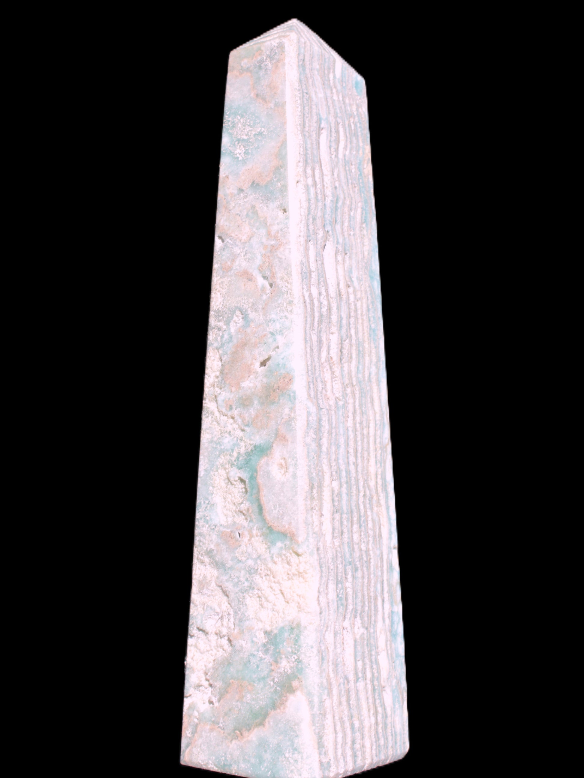 Caribbean Calcite obelisk 95*40*44mm 571g in bright sunlight - Rocks and Things Store