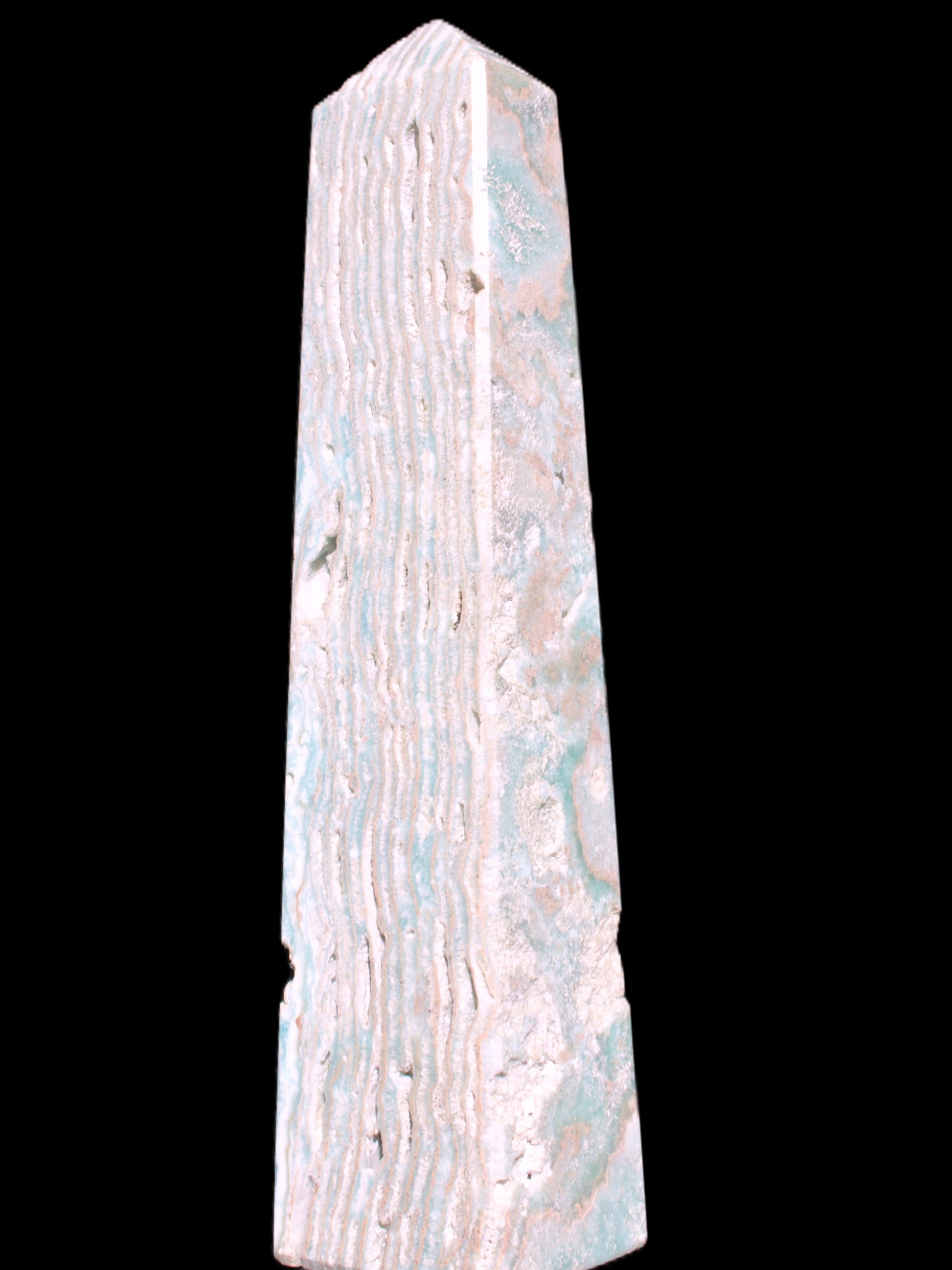 Caribbean Calcite obelisk 95*40*44mm 571g in bright sunlight - Rocks and Things Store