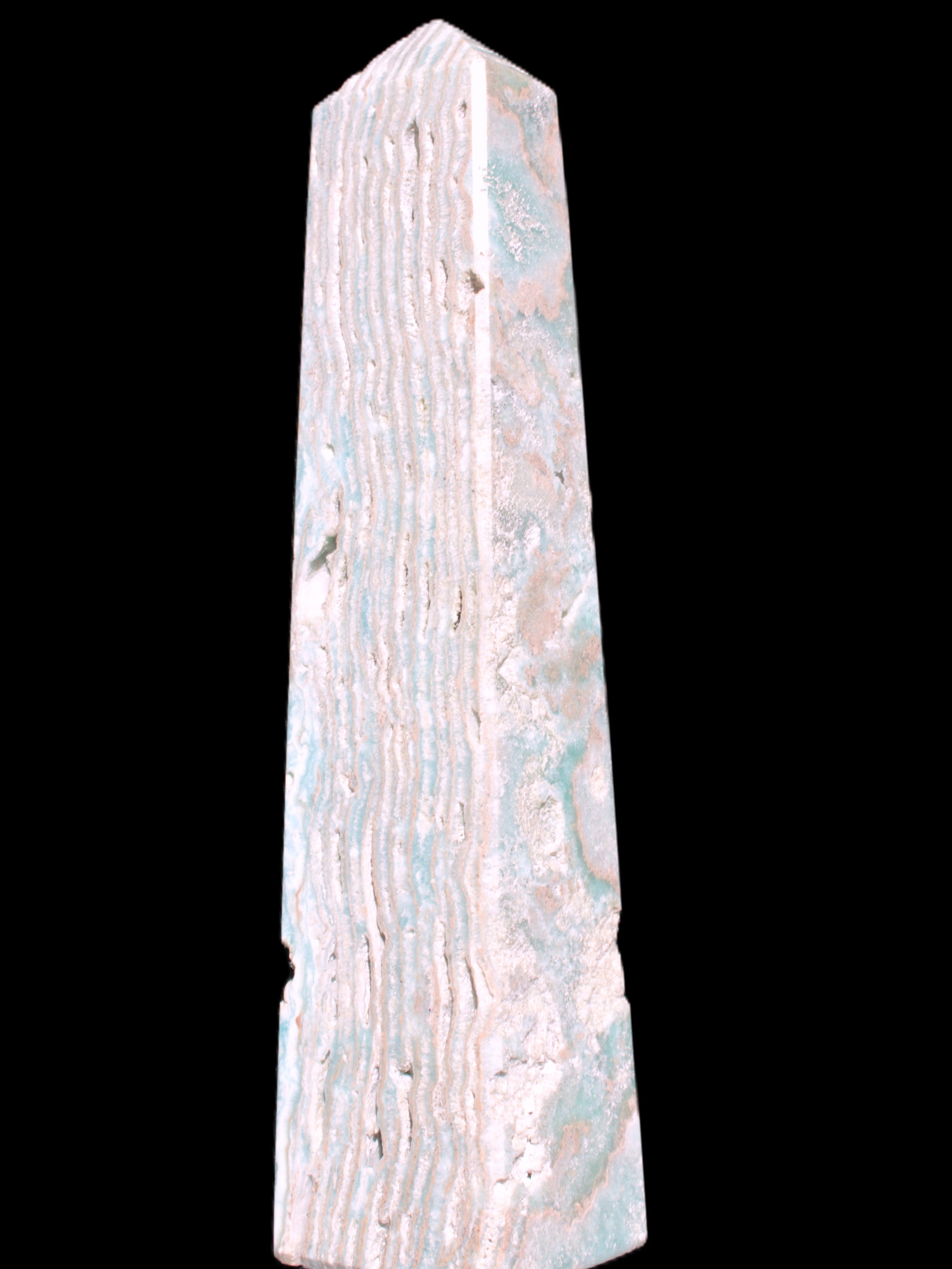 Caribbean Calcite obelisk 95*40*44mm 571g in bright sunlight - Rocks and Things Store