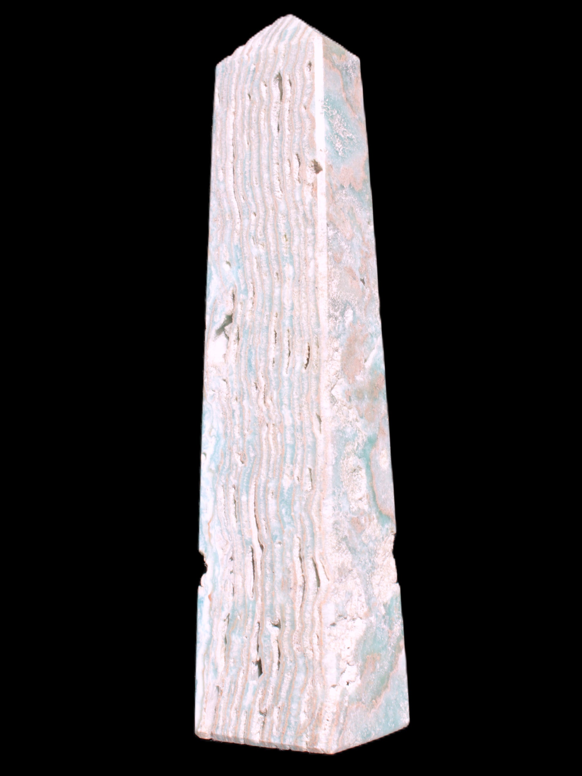 Caribbean Calcite obelisk 95*40*44mm 571g in bright sunlight - Rocks and Things Store
