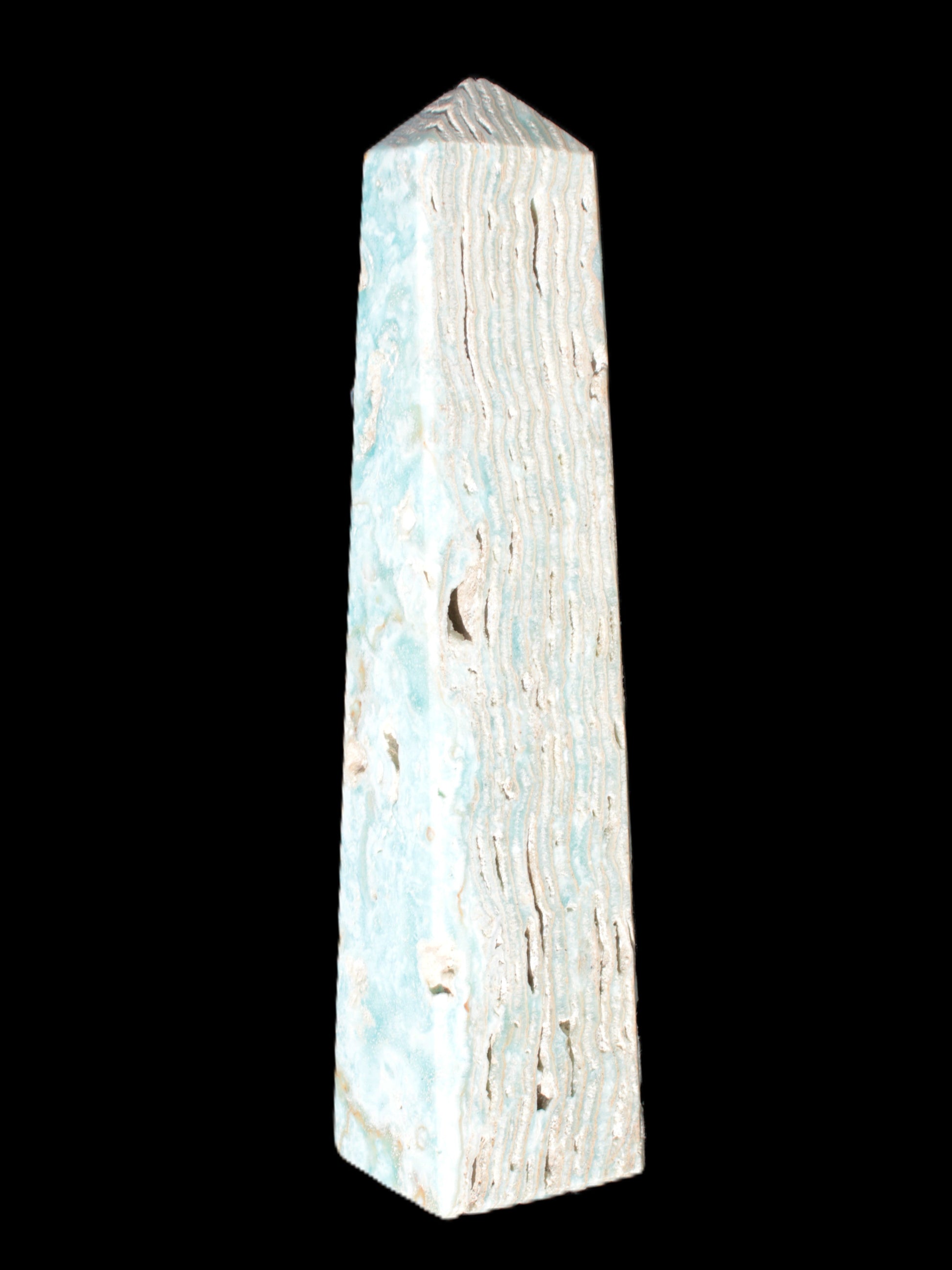 Caribbean Calcite obelisk 95*40*44mm 571g in bright sunlight - Rocks and Things Store