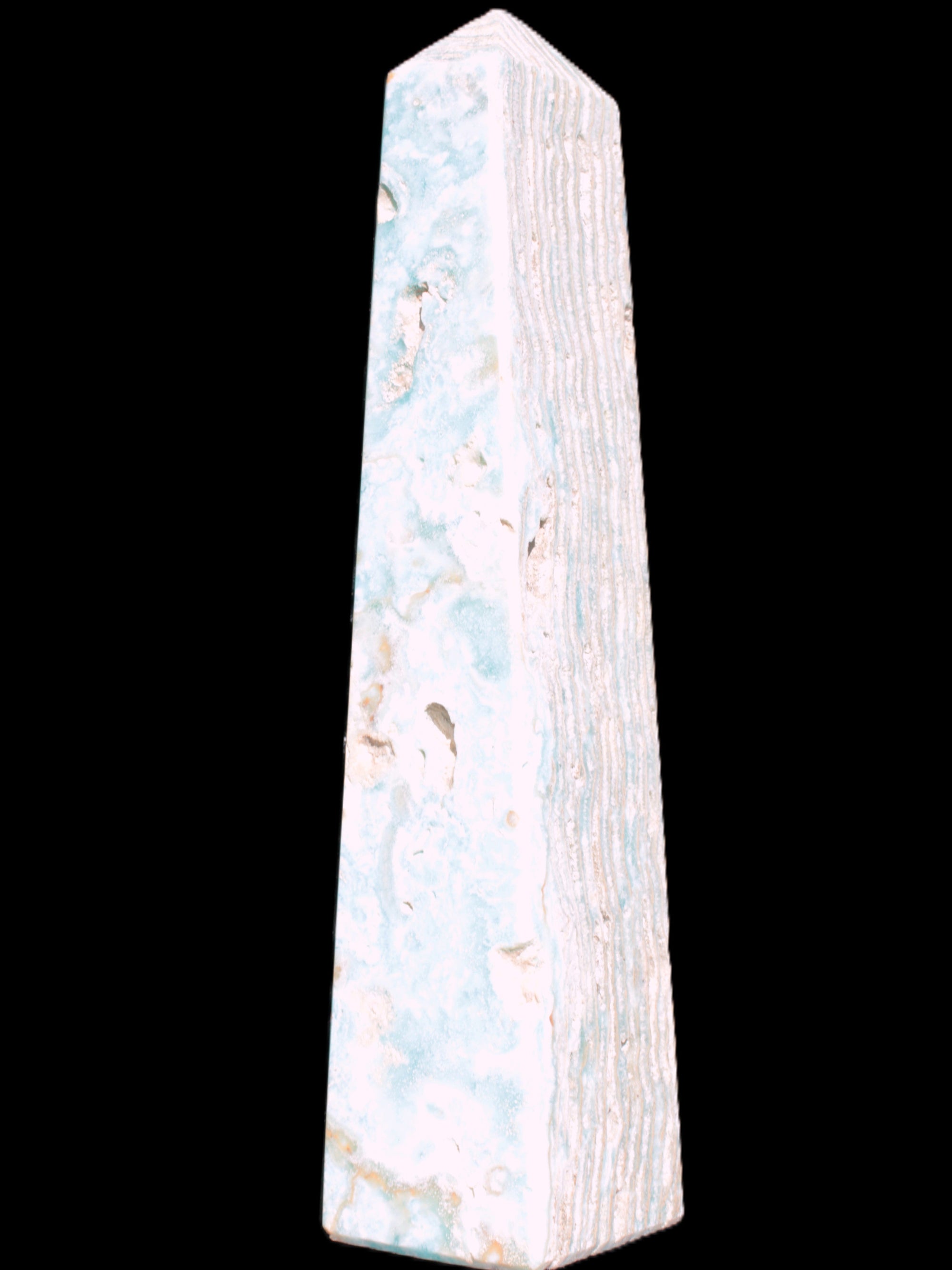 Caribbean Calcite obelisk 95*40*44mm 571g in bright sunlight - Rocks and Things Store
