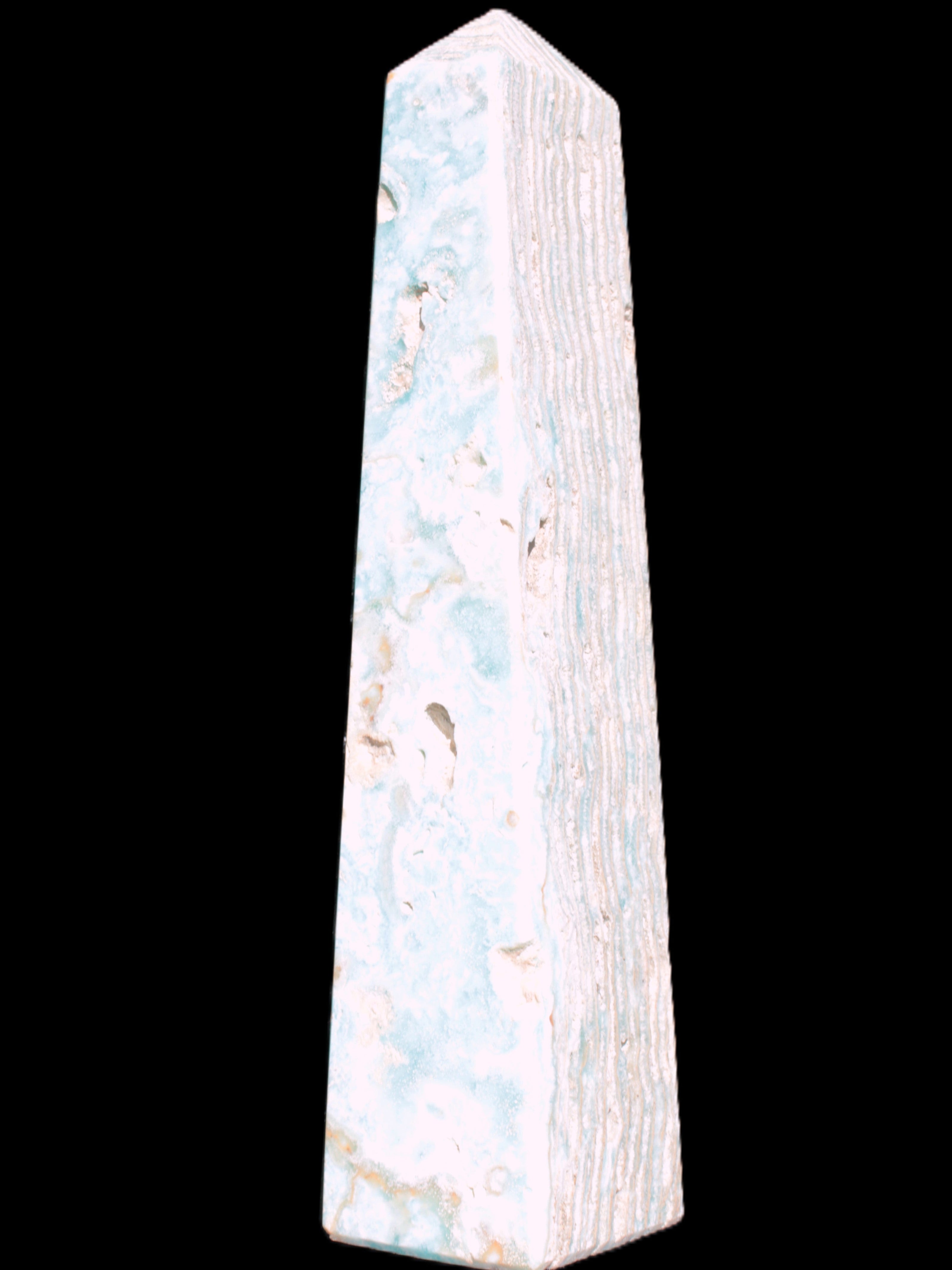Caribbean Calcite obelisk 95*40*44mm 571g in bright sunlight - Rocks and Things Store