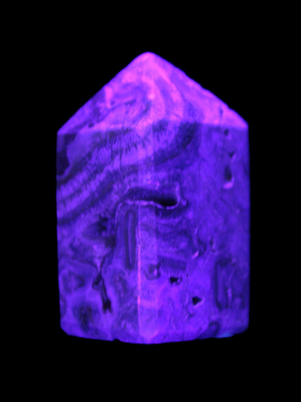Caribbean Calcite obelisk 55*26*29mm 94g in UV light -  Rocks and Things Store