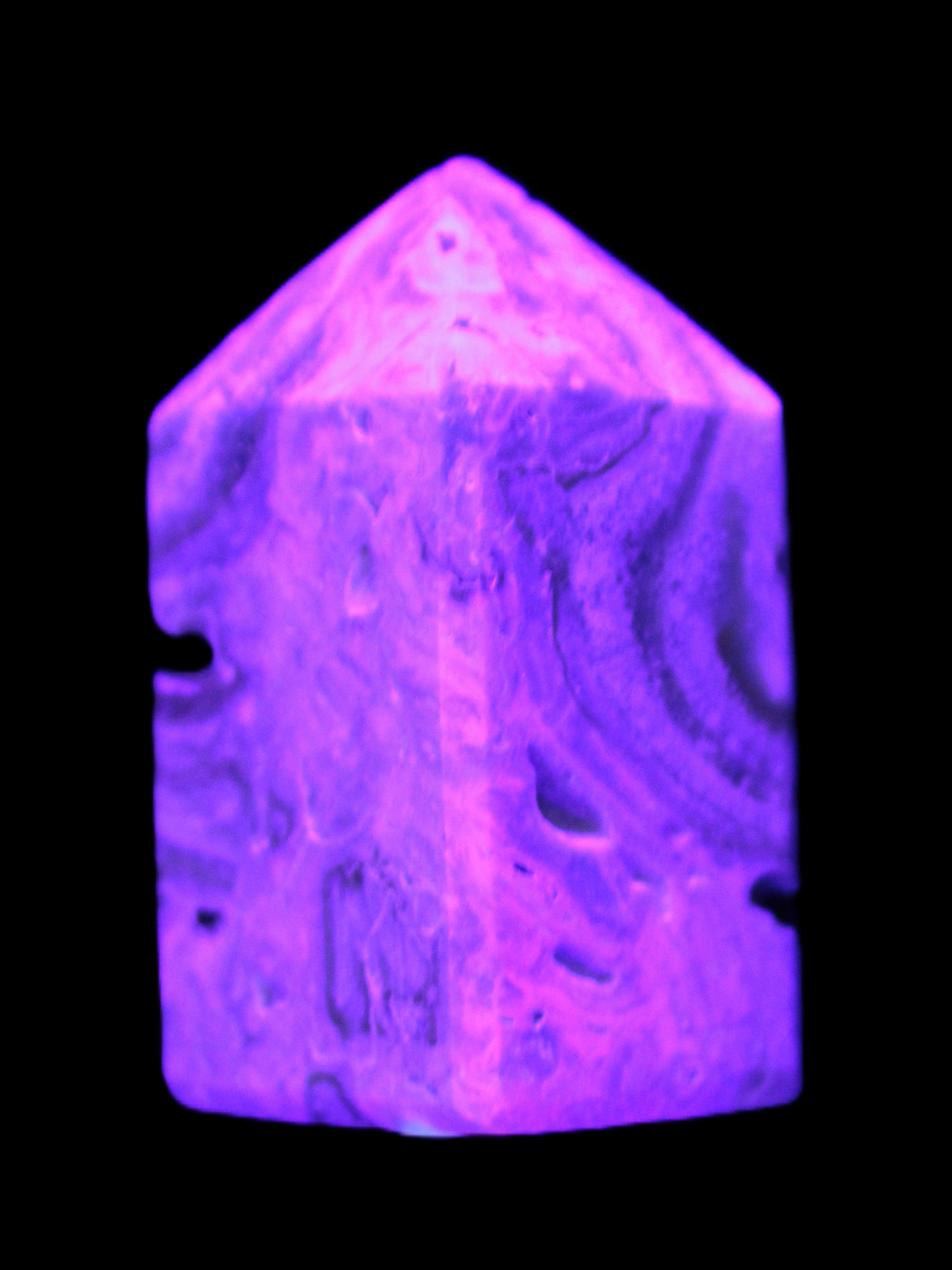 Caribbean Calcite obelisk 55*26*29mm 94g in UV light -  Rocks and Things Store