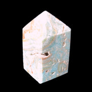 Caribbean Calcite obelisk 55*26*29mm 94g in sunlight -  Rocks and Things Store