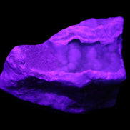 BBlue Aragonite specimen 65*38*48mm 141g in UV light - Rocks and Things Store