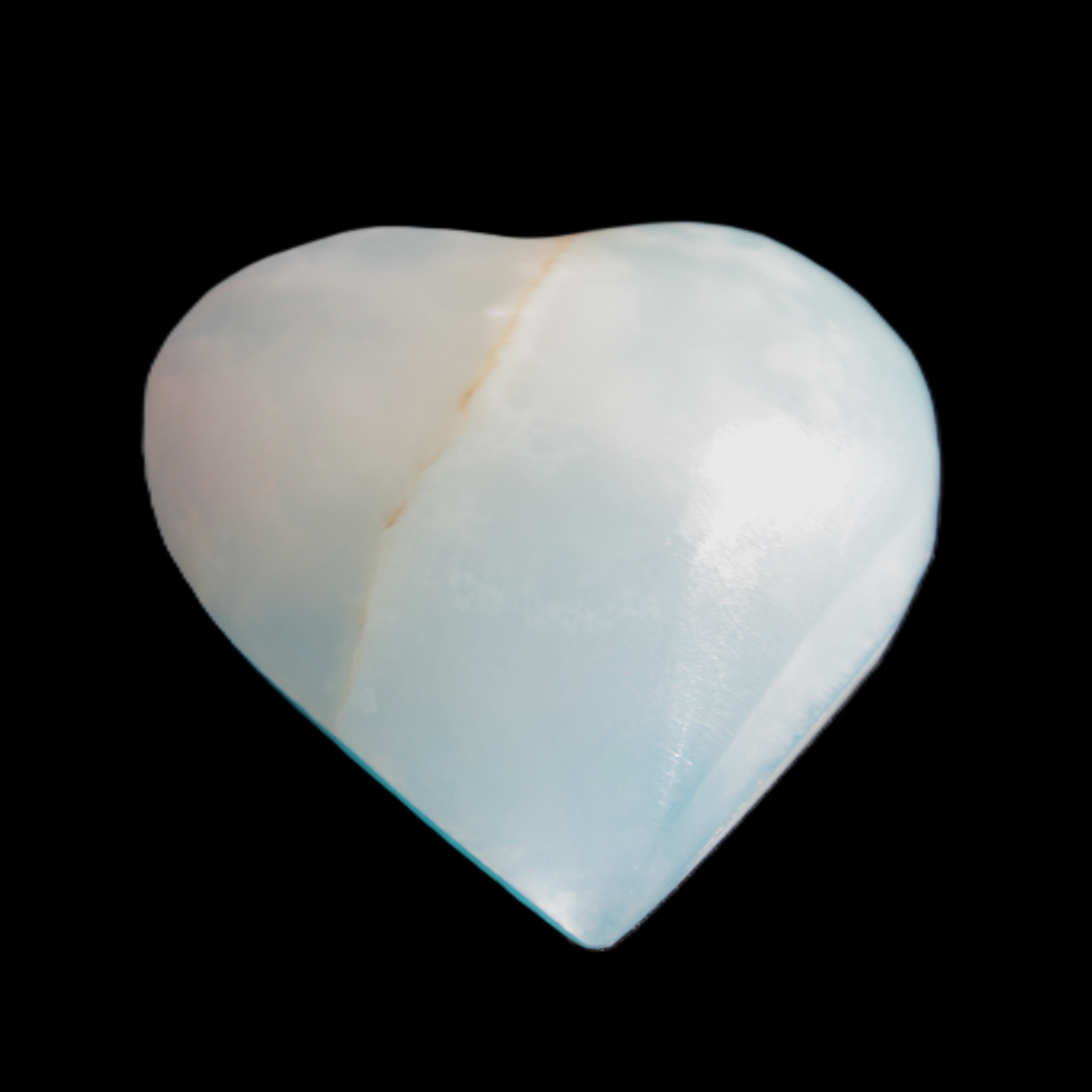 Calcite heart blue-dyed 55*56mm 94g in sunlight - Rocks and Things Store