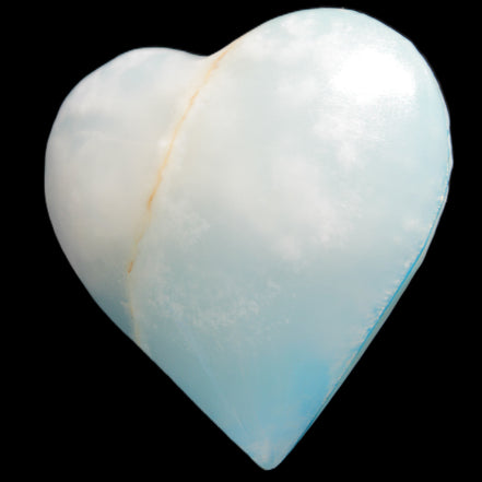Calcite heart blue-dyed 55*56mm 94g in sunlight - Rocks and Things Store
