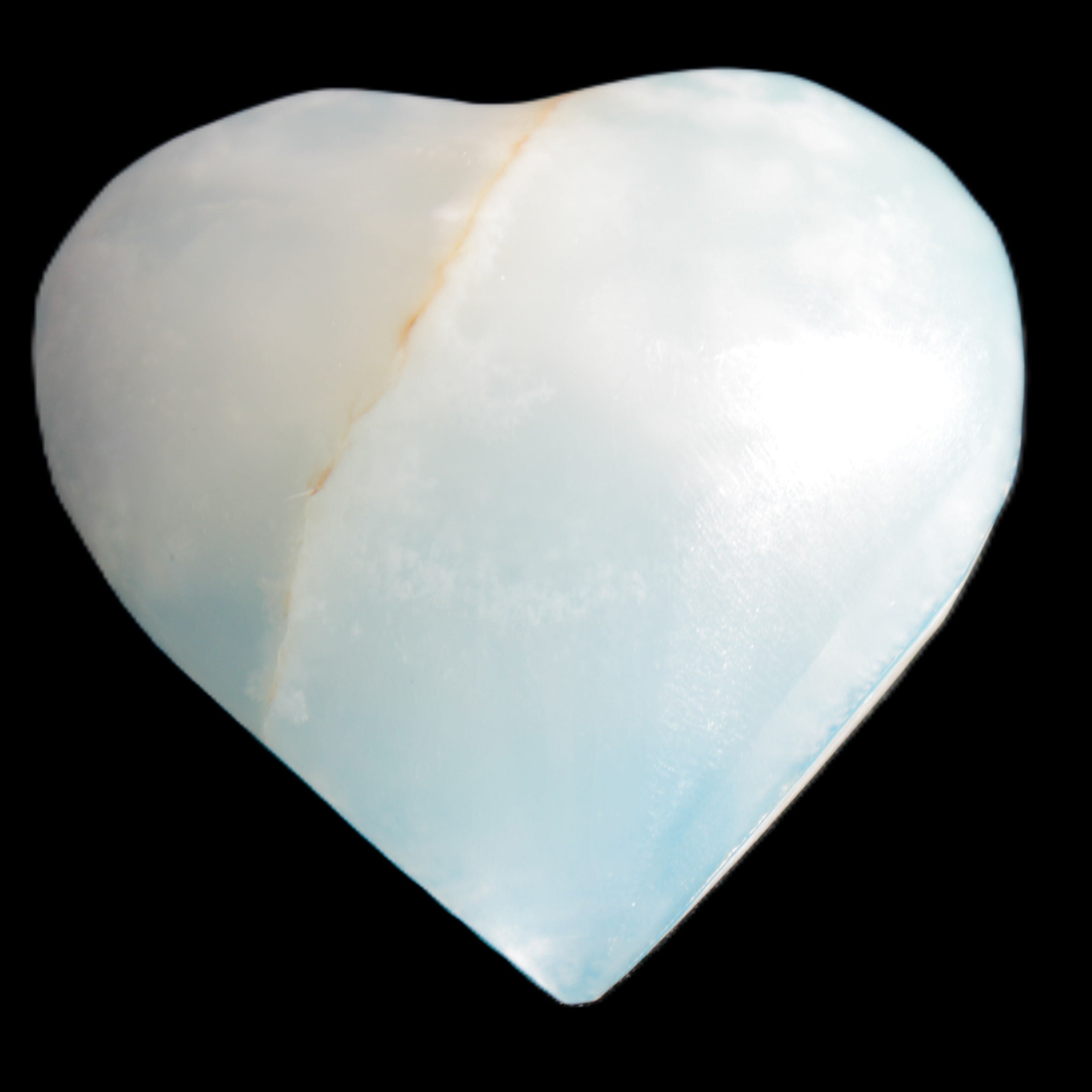Calcite heart blue-dyed 55*56mm 94g in sunlight - Rocks and Things Store