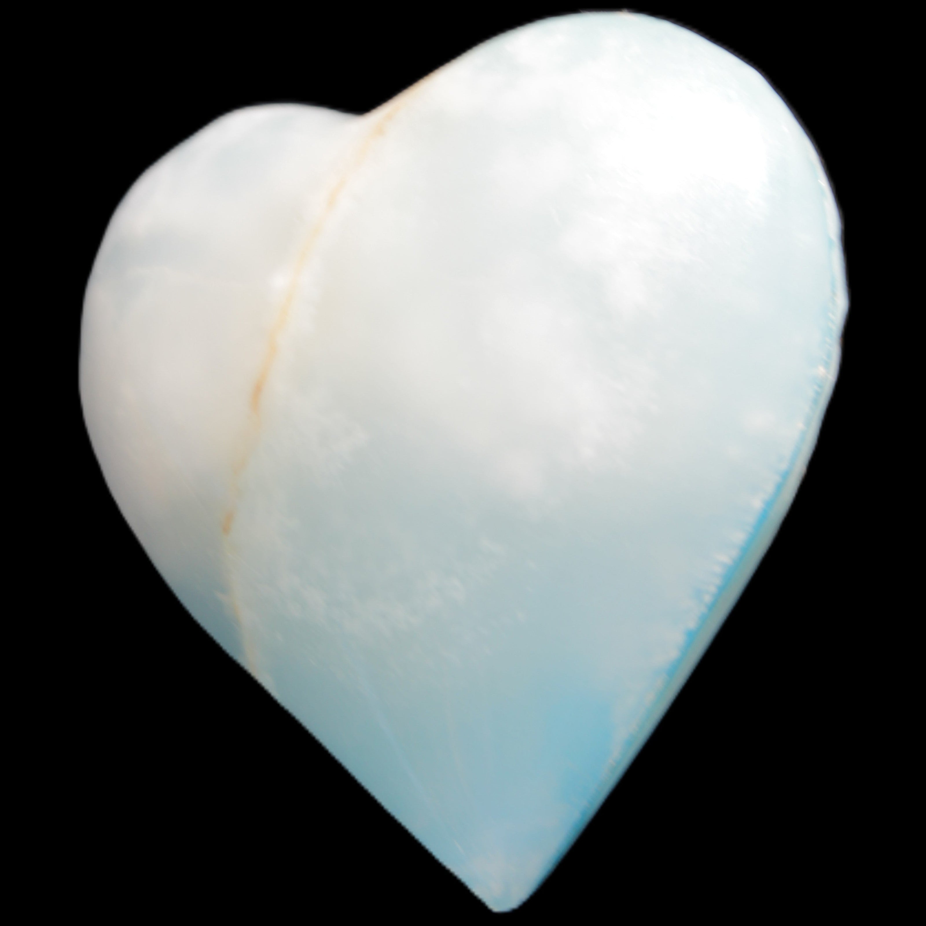 Calcite heart blue-dyed 55*56mm 94g in sunlight - Rocks and Things Store