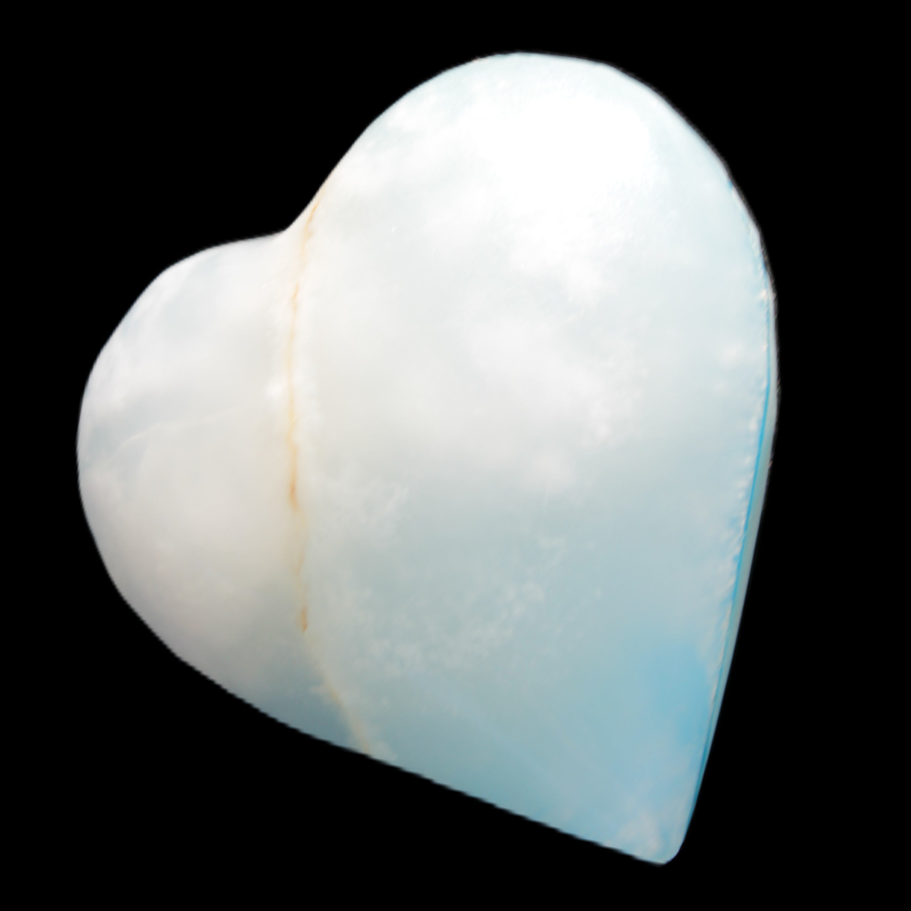 Calcite heart blue-dyed 55*56mm 94g in sunlight - Rocks and Things Store