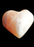 Honey Calcite heart 36mm 35.8g in sunlight - Rocks and Things Store